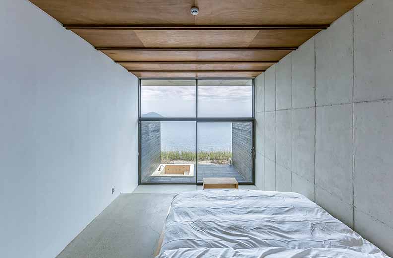 concrete house in countryside featured in Earth Works: Houses by Byoung Cho - Jipyo Ung Guest House, 2018