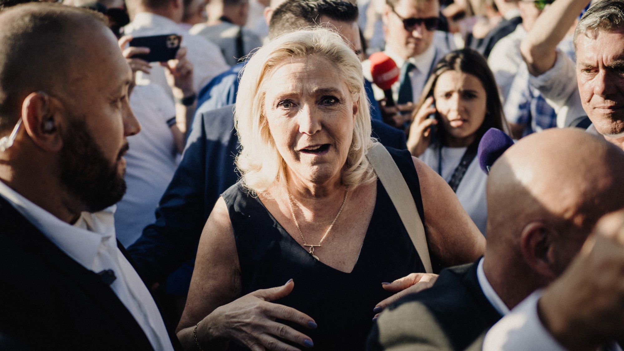Marine le Pen president of the Rassemblement National RN parliamentary group arrives and walks through the crowd during a Fete champetre an event organised by the Rassemblement National RN