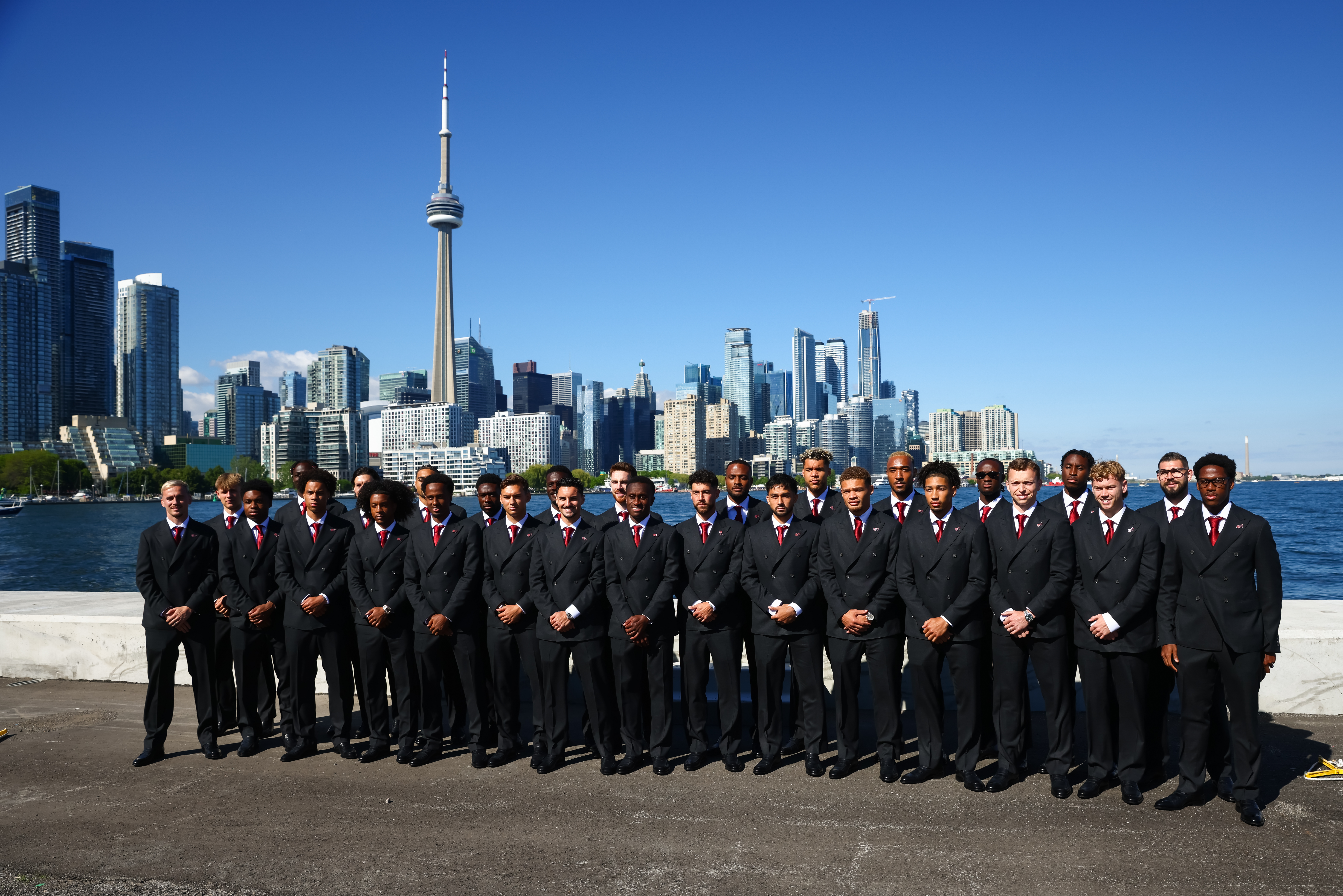 TORONTO, CANADA - JUNE 07: Team Canada pose along the waterfront after arriving at Billy Bishop Toronto City Airport for the FIFA World Cup 2026, in Toronto, Ontario, Canada on June 7, 2026 in Toronto, Canada. (Photo by Cole Burston/Getty Images)
