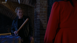 Shirley Carter with a baseball bat in EastEnders