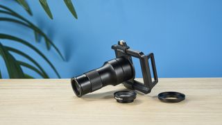 An Apexel TM6 TeleMacro lens for smartphones