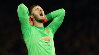 MANCHESTER, ENGLAND - DECEMBER 28: David De Gea of Manchester United reacts after a missed chance during the Barclays Premier League match between Manchester Untied and Chelsea at Old Trafford on December 28, 2015 in Manchester, England. (Photo by Matthew Ashton - AMA/Getty Images)