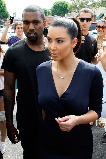 Kanye West and Kim Kardashian at the Dash store launch in Los Angeles