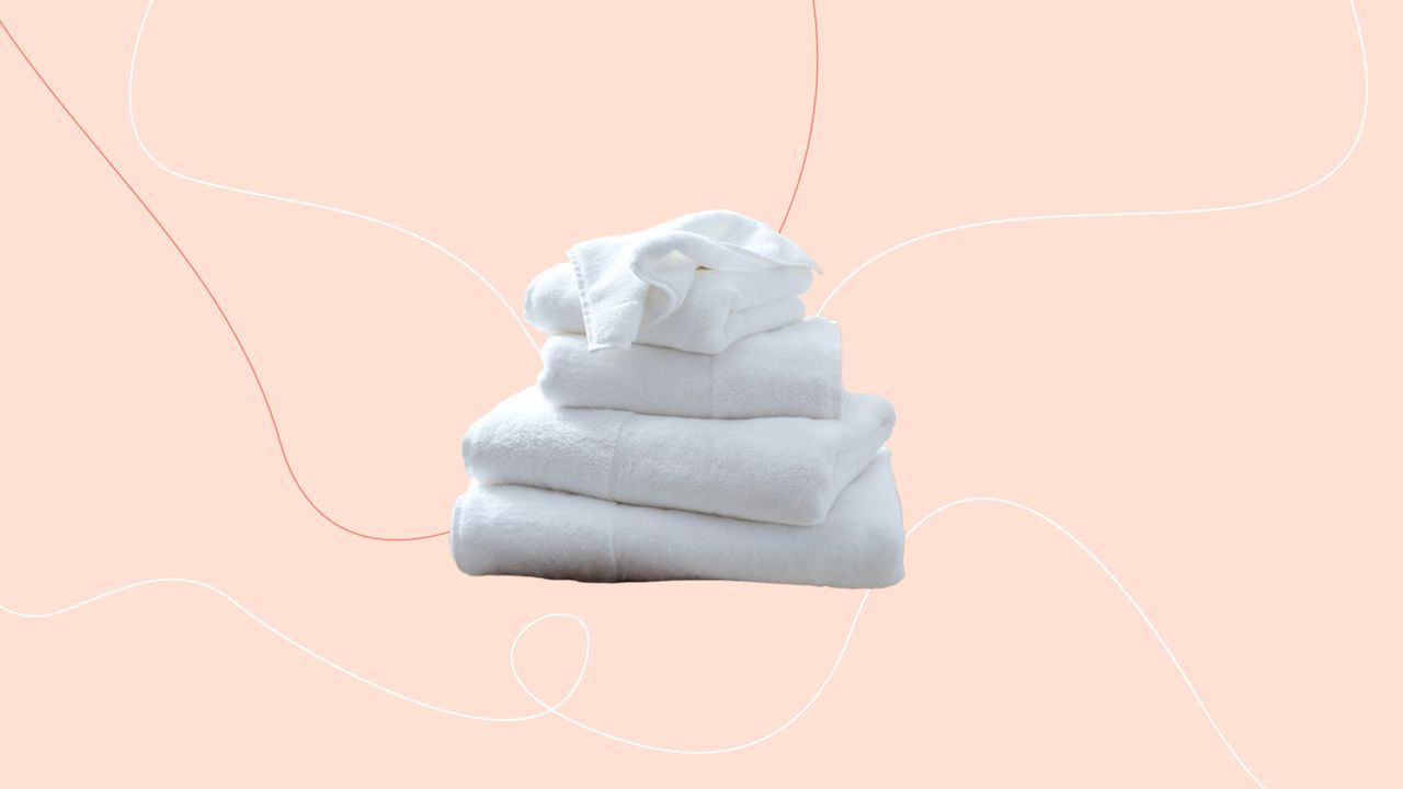 The white company towels on pink background