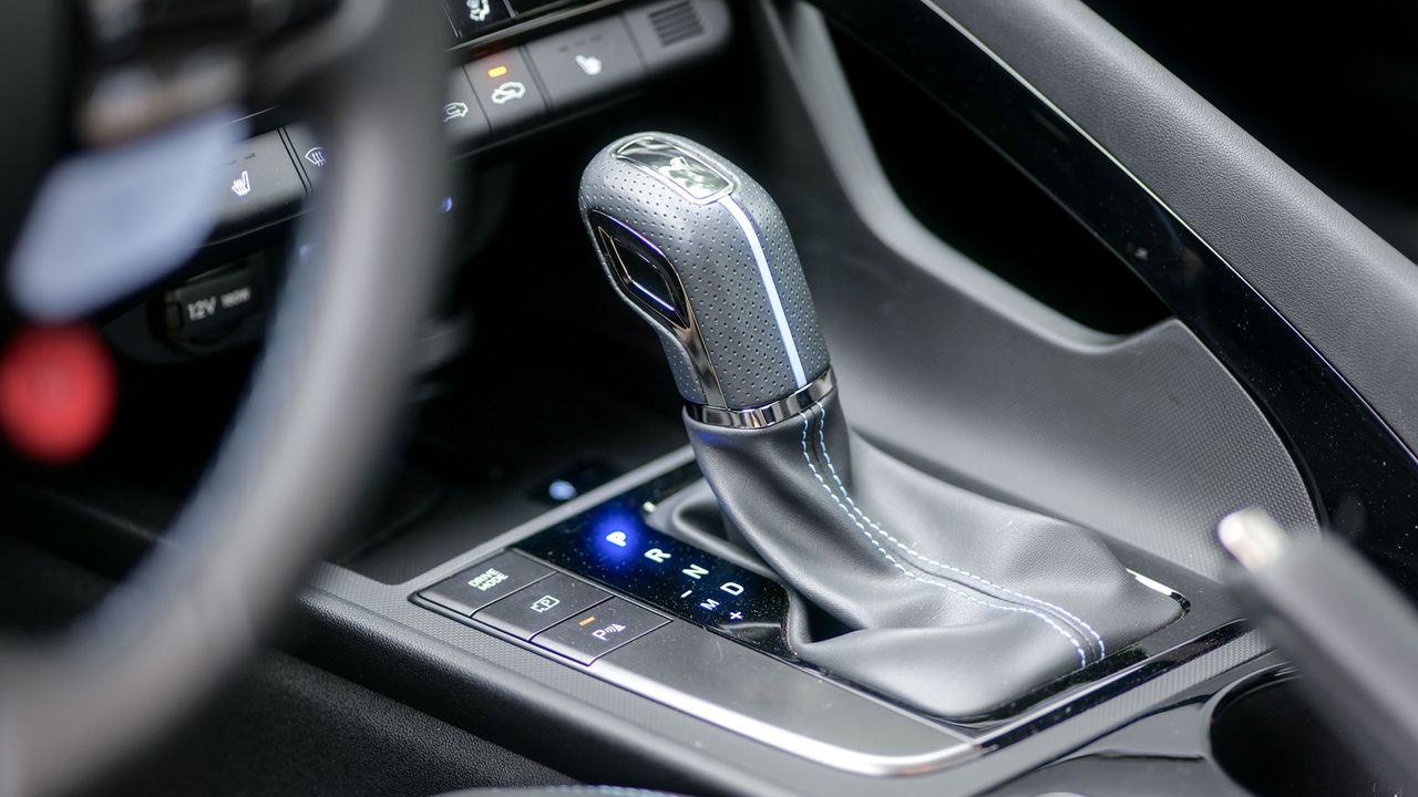 2025 Hyundai Elantra N test drive review pros and cons.