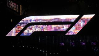 The F1 rooftop logo, escalator trapezoid, and three grandstand displays feature more than 33 million Samsung LED pixels and over 32,000 square feet. 