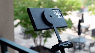 Galaxy S23 Ultra in a Mous Limitless case on a tripod mounted with a magnetic mount arm