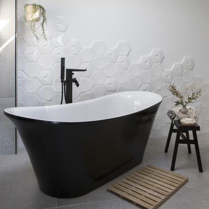 White bathroom with bath tub