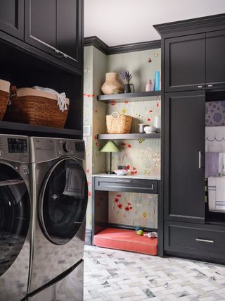 laundry room with storage baskets and dog bed