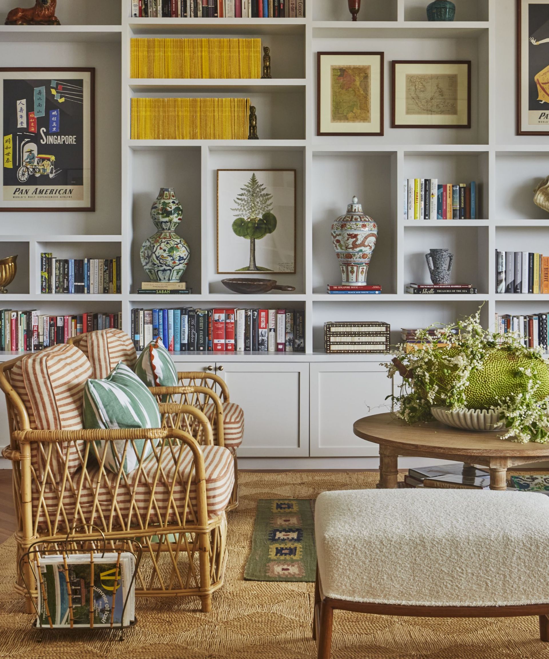 Wooden chairs with stripped cushions, white shelves