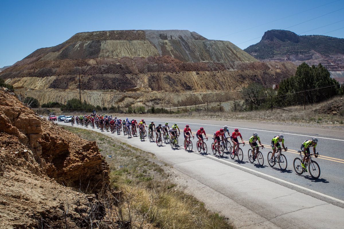 The men pass the Santa Rita mine on the way to the finish