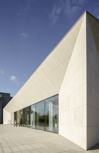 The centre’s exterior is clad in slabs of Jura limestone.