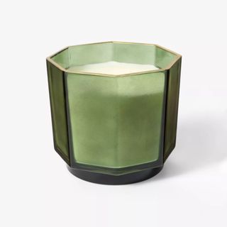 green pot candle with gold rim