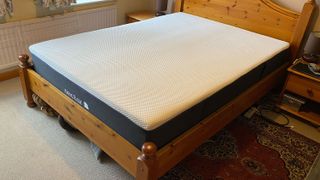 The Nectar Premier Hybrid mattress on a bed