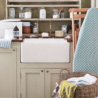 cream colour cabinet shelf ans wash basin