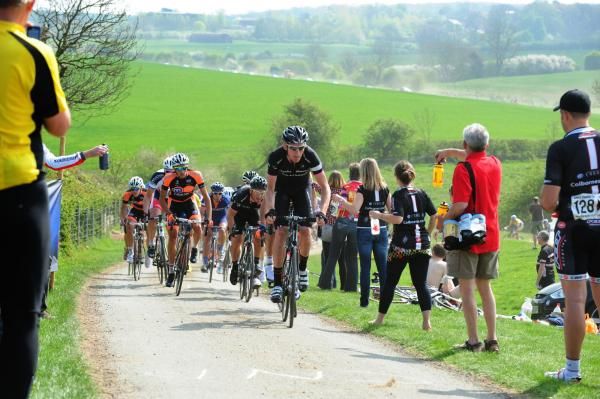 Eventual winner Zak Dempster leads the race in the feedzone outside Owston.