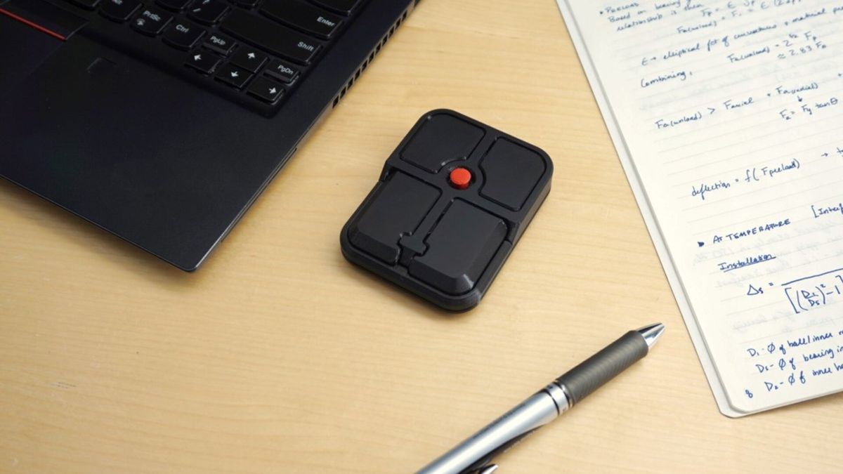 This weird-looking open-sourced computer mouse has four buttons plus a point stick which reminds me of IBM's legendary red nipple joystick