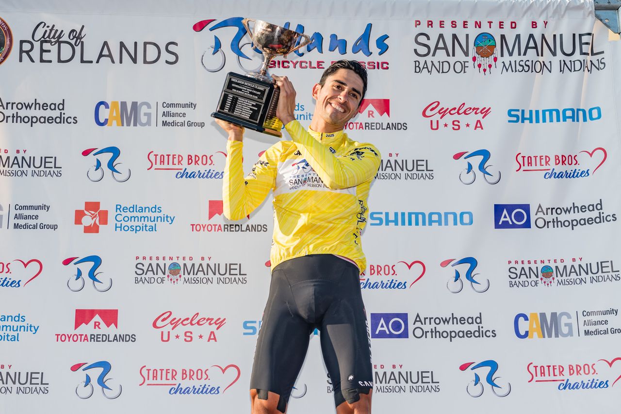 Eder Frayer celebrates the 2025 GC men's title at Redlands Bicycle Classic