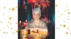 Liz Taylor smiles at one of her extravagant Christmas parties for clients