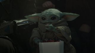 Grogu eating popcorn in The Mandalorian and Grogu