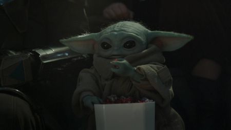 Grogu eating popcorn in The Mandalorian and Grogu