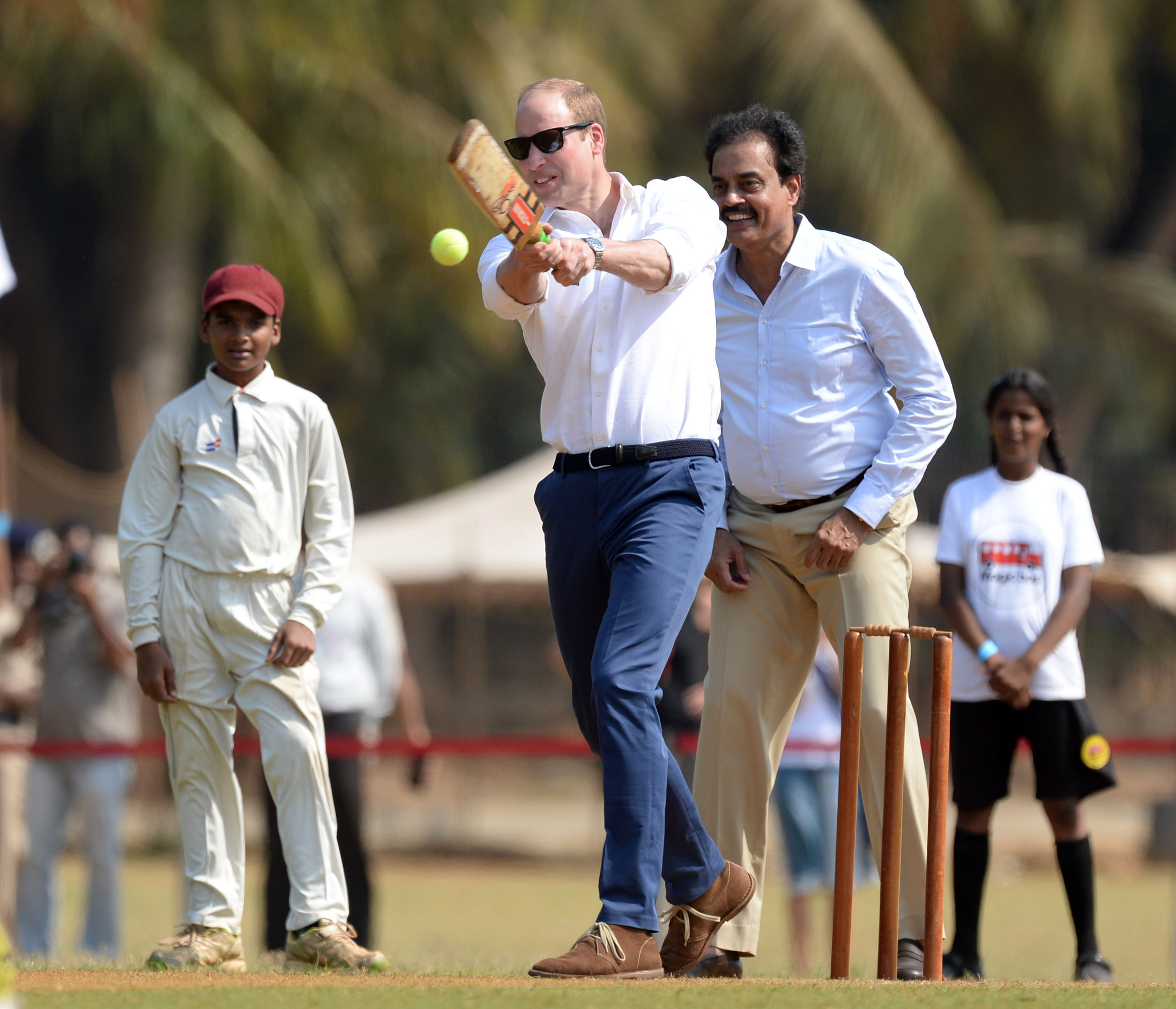 Prince William playing cricket