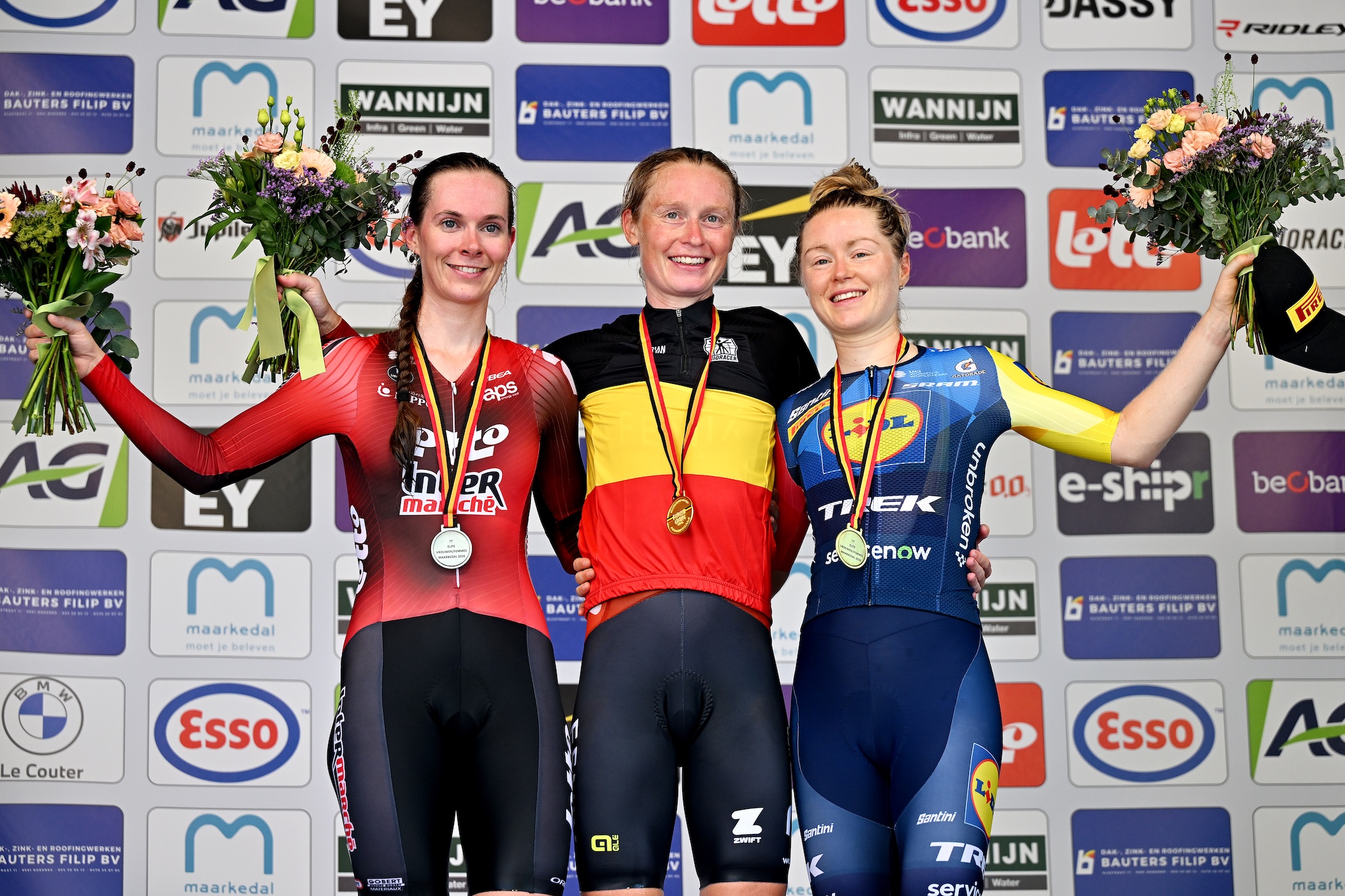 ETIKHOVE, BELGIUM - JUNE 26: Gold medalist Lotte Claes of Belgium (C), Silver medalist Sandrine Tas of Belgium (L) and Bronze medalist Margot Vanpachtenbeke of Belgium (R) pose on the podium during the 107th National Championships Belgium 2026, Women&acute;s Individual Time Trial a 20.7km a 20.7km one day race from Etikhove to Etikhove / #UCIWWT / on June 26, 2026 in Etikhove, Belgium. (Photo by Luc Claessen/Getty Images)