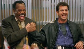 Danny Glover as Roger Murtaugh and Mel Gibson as Martin Riggs in Lethal Weapon