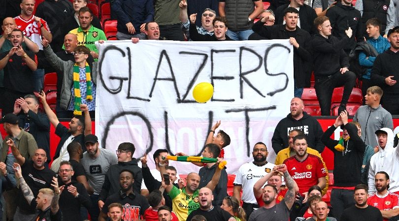 MAnchester United fans with a &#039;Glazers out&#039; banner at Old Trafford in their Premier League game against Nottingham Forest in August 2023.