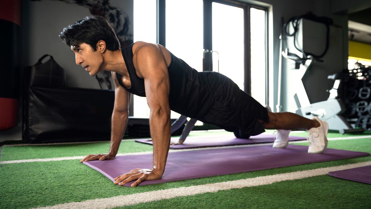 A top strength coach shares a five-move weight-free workout to build a bigger chest