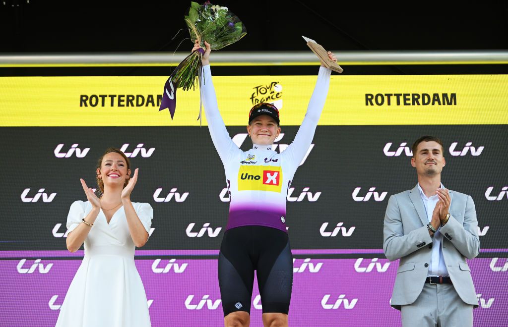 ROTTERDAM NETHERLANDS AUGUST 13 Anniina Ahtosalo of Filand and Team UnoX Mobility celebrates at podium as White best young jersey winner during the 3rd Tour de France Femmes 2024 Stage 3 a 679km individual time trial stage from Rotterdam to Rotterdam UCIWWT on August 13 2024 in Rotterdam Netherlands Photo by Dario BelingheriGetty Images