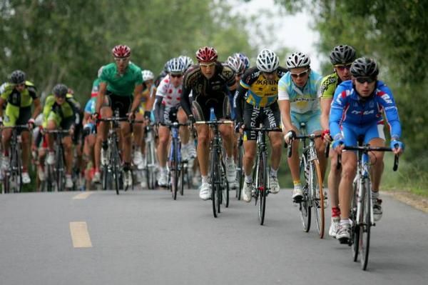 Sergey Kolesnikov (Russia) leads the peloton.