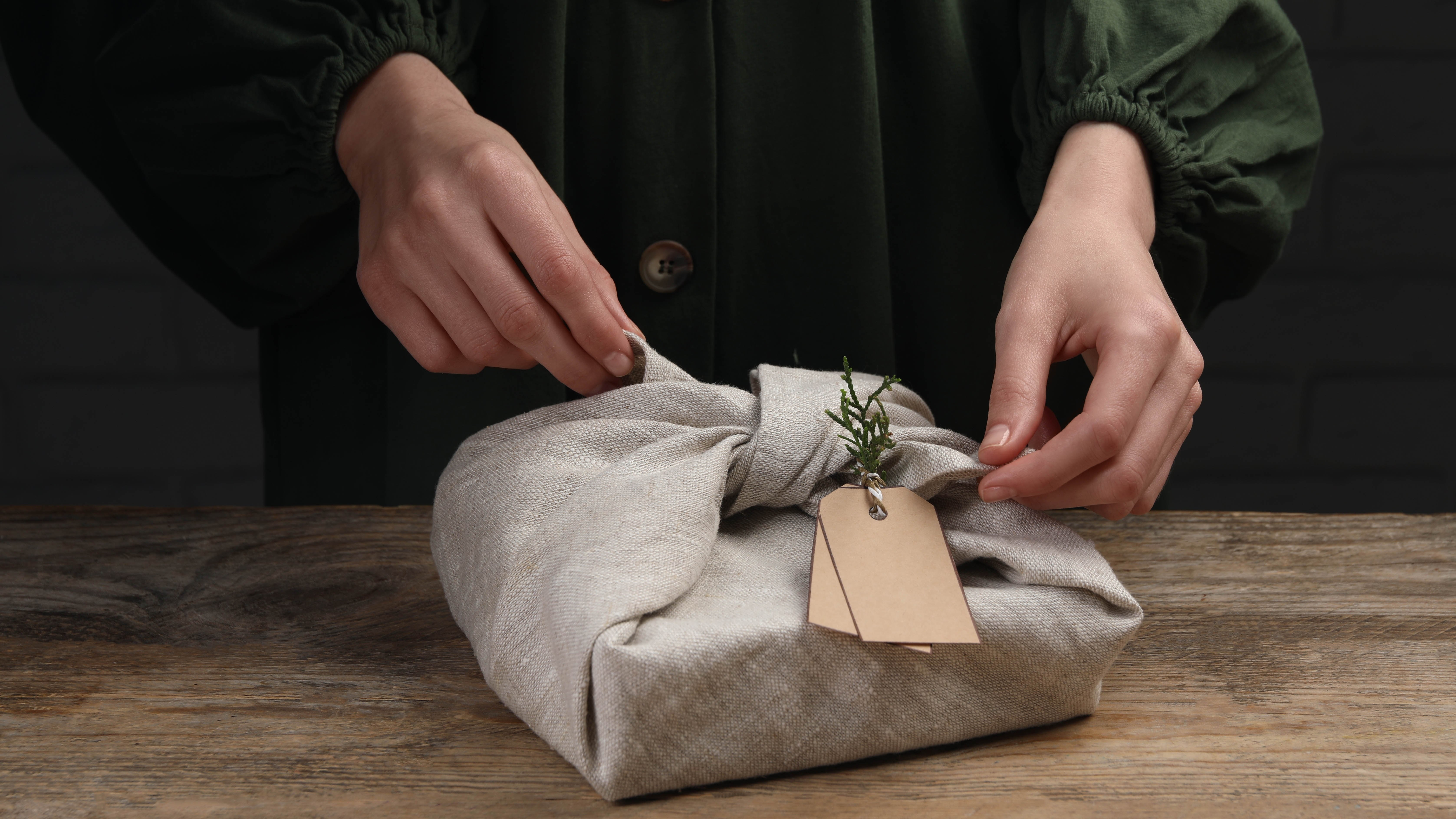 Wrapping a gift in fabric