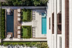 Aerial view of the Arte façade, pool and landscaping