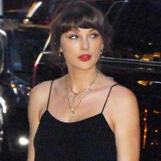Taylor Swift returned to New York City in a '90s-inspired white satin skirt trend inspired by Carolyn Bessette-Kennedy