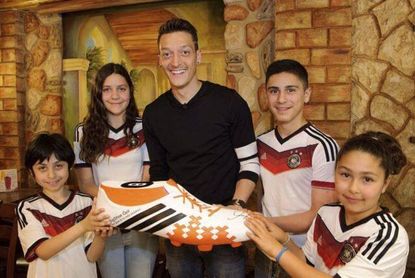 German soccer star donates World Cup winnings to needy Brazilian children