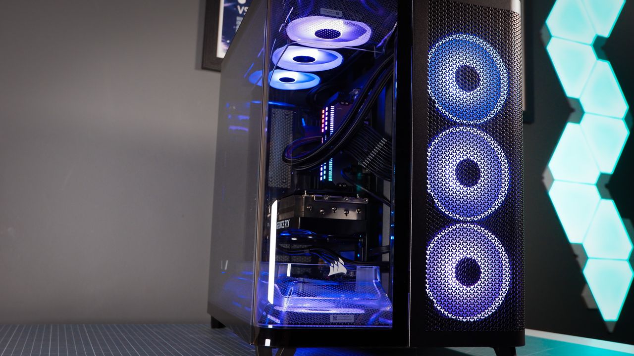 A Corsair Air 5400 PC case on a desk with various parts installed.