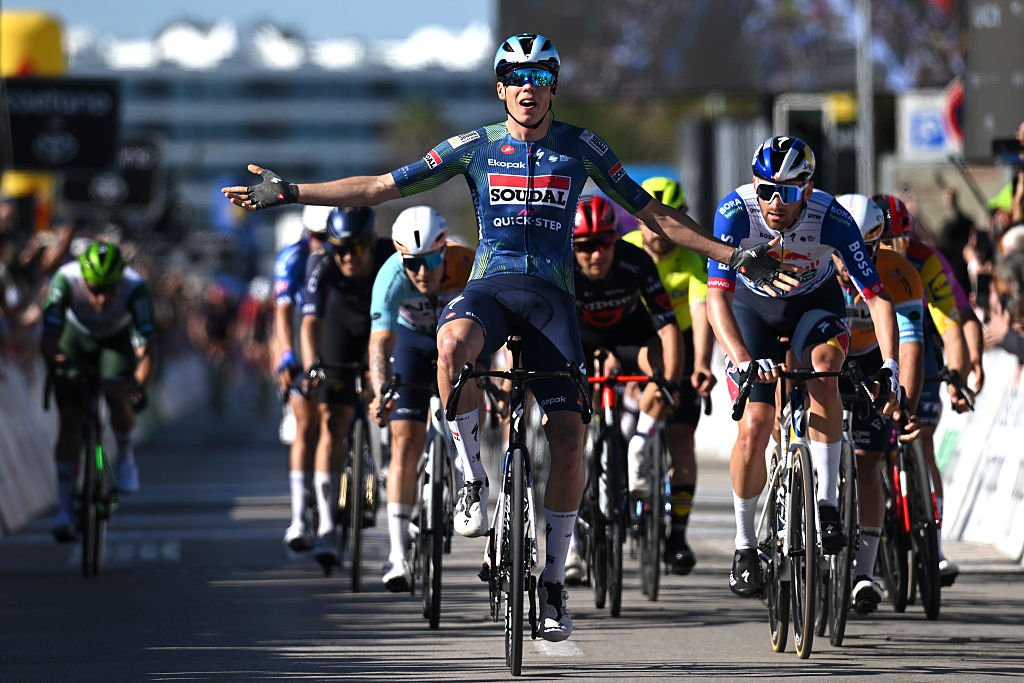 LAGOS, PORTUGAL - FEBRUARY 21: (L-R) Paul Magnier of France and Team Soudal Quick-Step celebrates at finish line as stage winner ahead of Jordi Meeus of Belgium and Team Red Bull - BORA - hansgrohe during the 52nd Volta ao Algarve em Bicicleta 2026, Stage 4 a 175.1km stage from Albufeira to Lagos on February 21, 2026 in Lagos, Portugal. (Photo by Dario Belingheri/Getty Images)