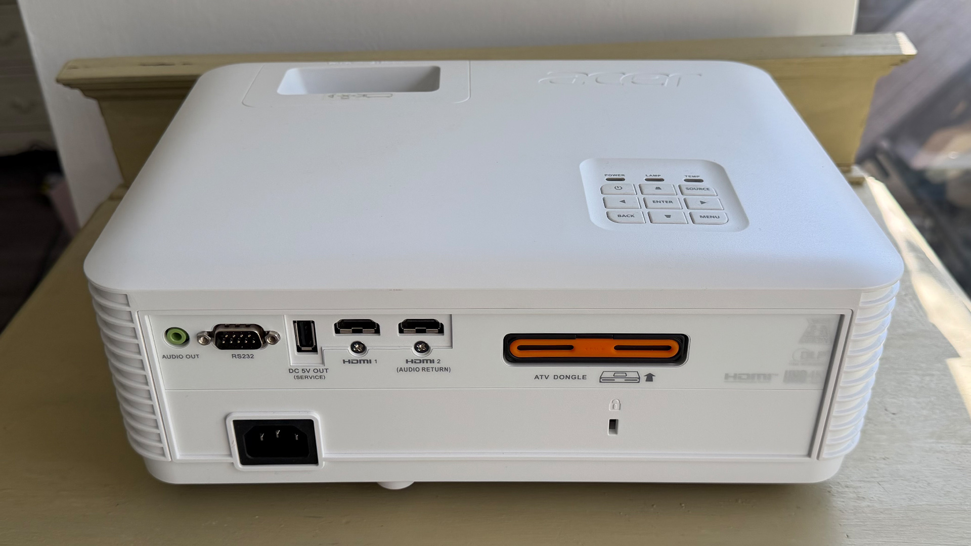Acer Vero HL6810ATV home cinema projector on wooden furniture rear of unit