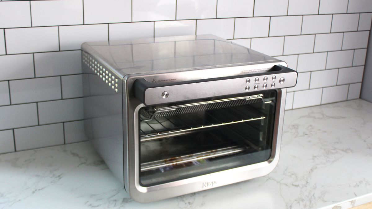 Ninja Prestige Smart XL Air Fryer &amp; Countertop Oven being tested in a white kitchen