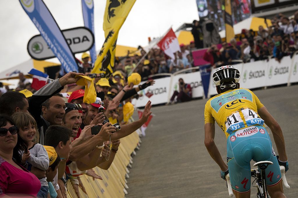 Italys Vincenzo Nibali wearing the overall leaders yellow jersey rides in a breakaway near the finish line during the 1455 km eighteenth stage of the 101st edition of the Tour de France cycling race on July 24 2014 between Pau and Hautacam southwestern France AFP PHOTO LIONEL BONAVENTURE Photo credit should read LIONEL BONAVENTUREAFP via Getty Images