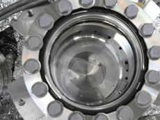 Scientists have found small particles inside the sample container of the Japanese asteroid probe Hayabusa, though it remains to be seen if they are asteroid bits or contamination from Earth. Here, particles are visible in re-entry capsule's sample contain