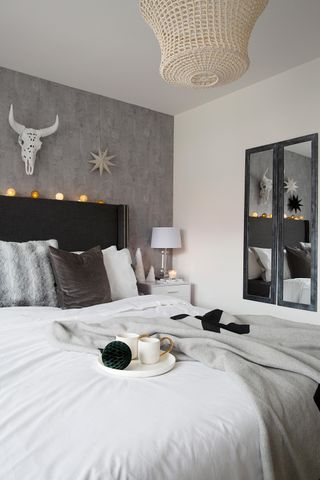 Grey and white bedroom with mirrors