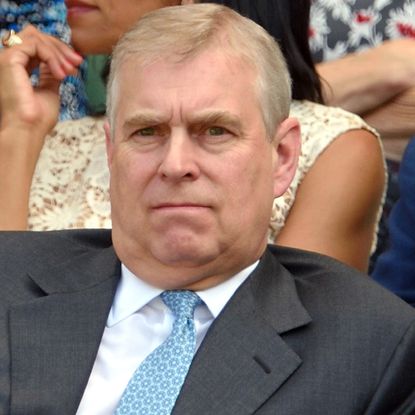 Prince Andrew wears a suit and tie at Wimbledon