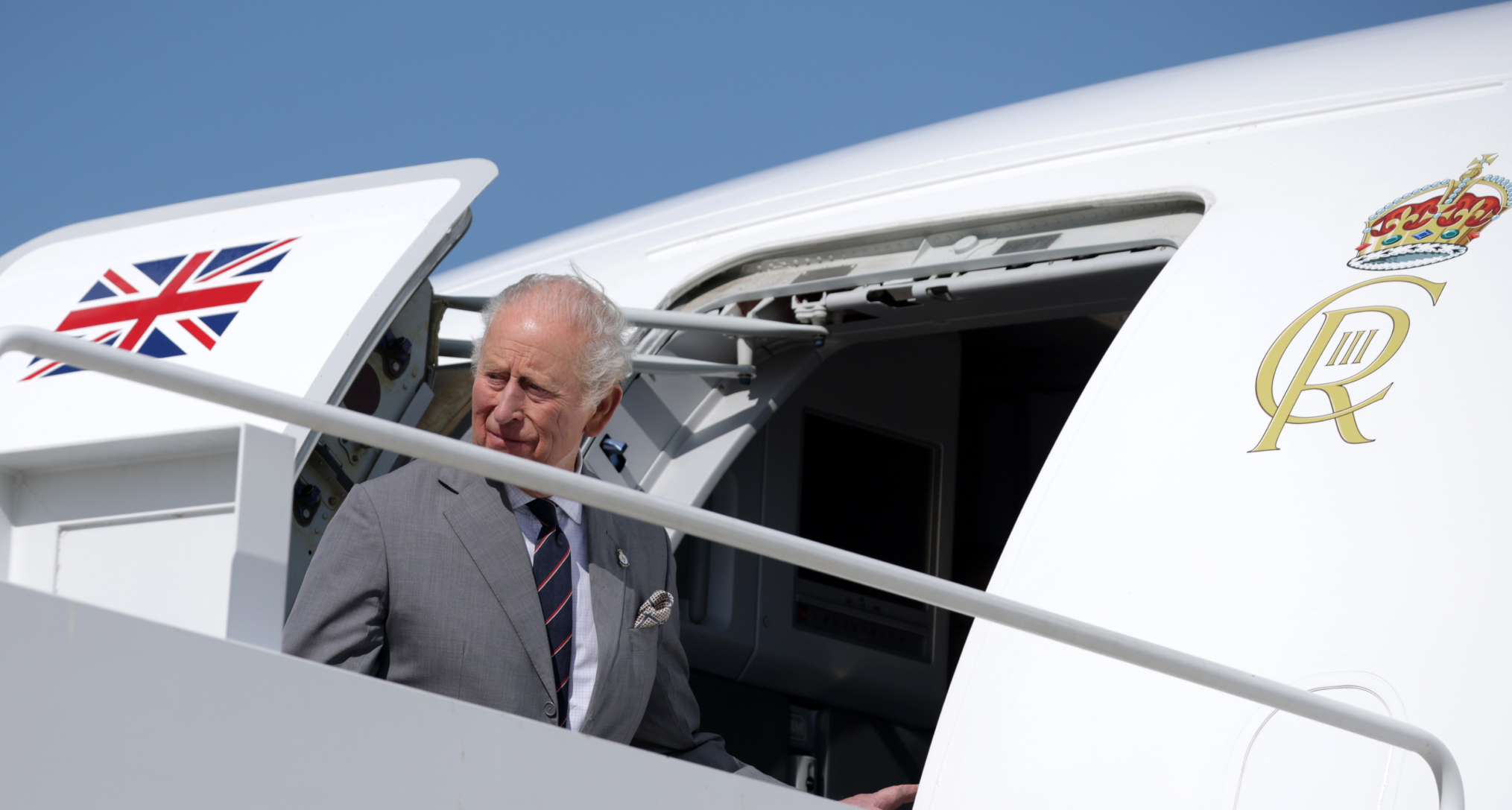 King Charles getting on a plane 