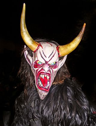 man in devil mask