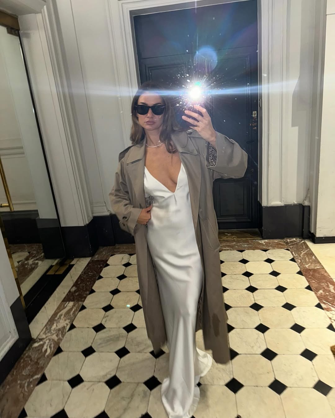 A strappy silk dress and trench outfit