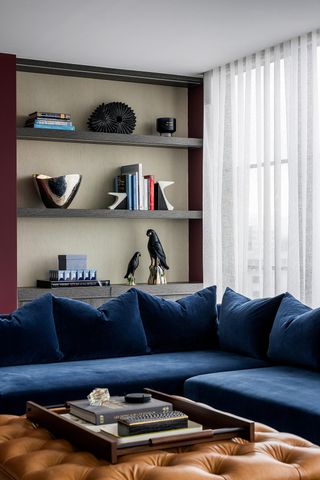 A blue sofa in a living room