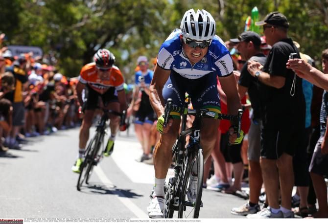 Simon Gerrans (Orica GreenEDGE) grits his teeth and looks to drop Cadel Evans
