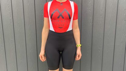 Female cyclist wearing the Rapha Women's Core Bib Shorts